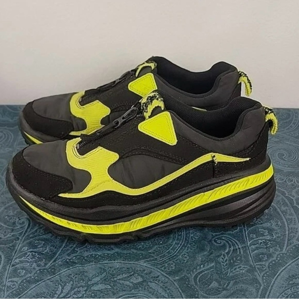 Ugg Black and Yellow zip Sneakers